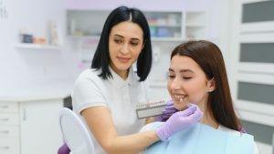 Quais são os aspectos éticos e legais relacionados ao Auxiliar de Saúde Bucal?